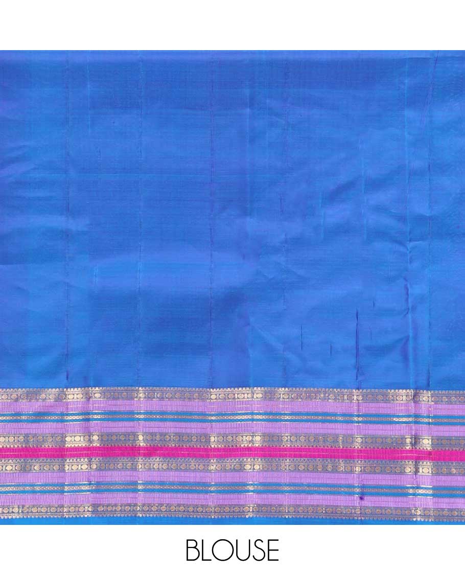 Violet and Mayil Blue Vasundhara Silk Saree, Subtly Sparkled with Zari Buttas All Over Its Body, Highlighted by Self-Border of Thilakam Mokku, Rudraksham, Muthu, and Mayil Kann Designs, Diagonally Striped Pallu, and Paired with a Matching Blouse