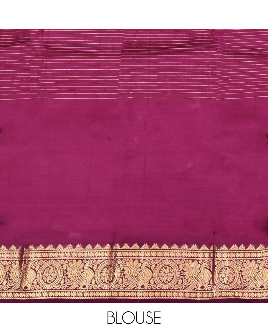 Purple Vasundhara Lite Silk Mix Saree, Artfully Detailed with Mayil-Chakram Buttas and Zari Checks All Over Its Body, Highlighted by a Zari Border of Thazampoo Rekkum, Paisa, Mayil, and Chakram Designs, a Grand Pallu, and Paired with a Matching Blouse