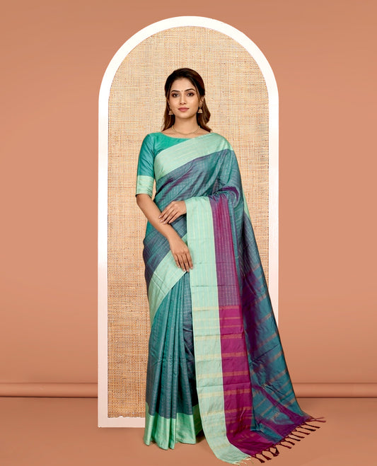 Blue Aarani Silk Saree, Dazzled with Butta Enclosed Checked Design on Its Body, Complemented by a Contrast Zari Striped Border, Pallu of Butta Enclosed Checks, and Paired with a Matching Blouse