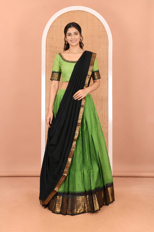 Leaf Green-Black Chettinad Cotton Half-Saree, Plain Contrast Traditional Zari-Bordered Skirt, Matching Blouse, and a Contrast Dhavani