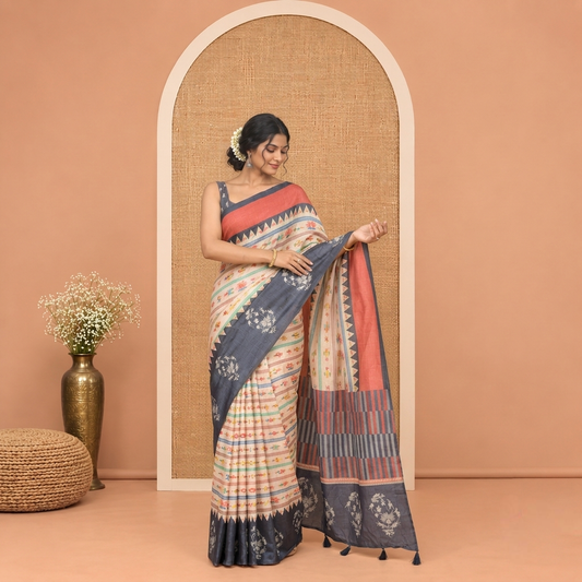Chikku Semi-Tussar Saree Features Fish, Bird, and Human Motifs, Contrast Ganga-Jamuna Temple Floral Border, Geometric-Floral Print Pallu, and a Contrast Blouse