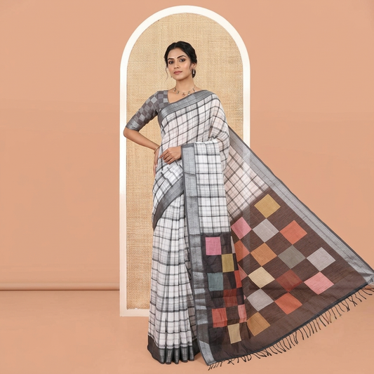 White Linen Cotton Saree, Adorned with Checked Design on Its Body, Complemented by a Contrast Zari Border, Multi-Color Checked Pallu, and Paired with a Contrast Blouse
