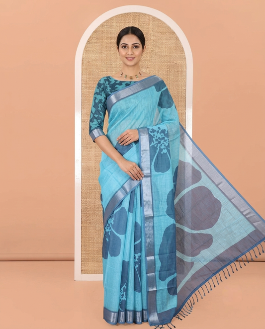 Blue Linen Cotton Saree, Prettified with Floral Print All Over Its Body, Complemented by a Contrast Zari Bavanji Border, Floral Printed Pallu, and Paired with a Matching Blouse