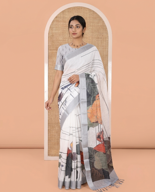 Grey Linen Cotton Saree, Beautified with Tropical Floral Print on Its Body, Complemented by a Contrast Plain Border, Floral Printed Pallu, and Paired with a Contrast Blouse