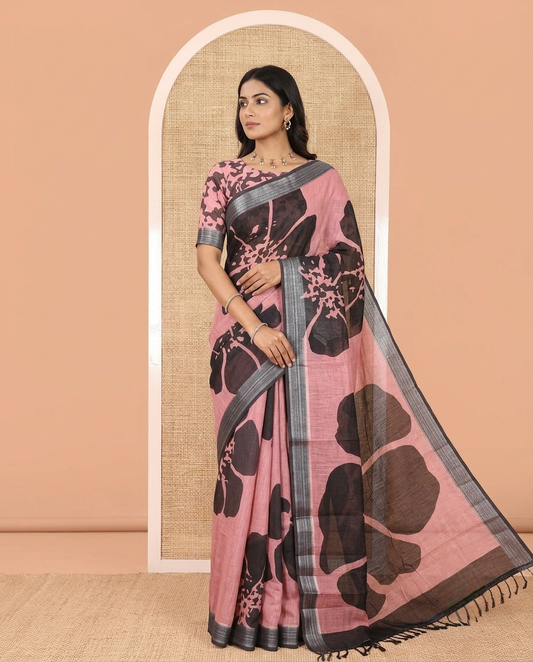 Pink Linen Cotton Saree, Prettified with Big Floral Motifs Printed on Its Body, Complemented by Contrast Border, Pallu of Floral Hand Block Print, and Paired with a Matching Blouse