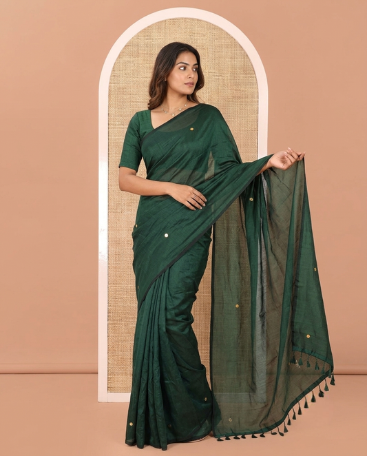 Borderless Bottle Green Vichitra Silk Saree, Gleamed Up with Sequin Work on Its Body, Highlighted by a Self-Pallu of Sequin Work, and Paired with a Matching Blouse