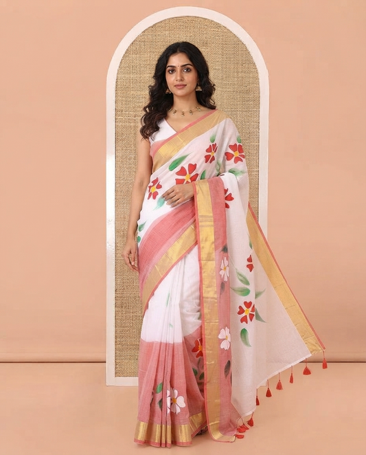 White and Peach  Khadi Mul Cotton Saree, Adorned with Hand-Brush Painting-Style Floral Block Printed Body, a Subtle Gold Zari Border, a Self-Pallu, and Paired with a Matching Blouse