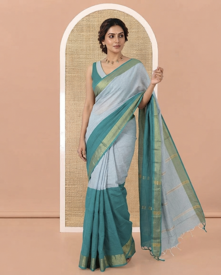 Peacock Green Khadi Mul Cotton Saree, Adorned with Half-And-Half-Style Double-Colour Dyed on Its Body, a Subtle Zari Border, Striped Pallu, and Paired with a Matching Blouse