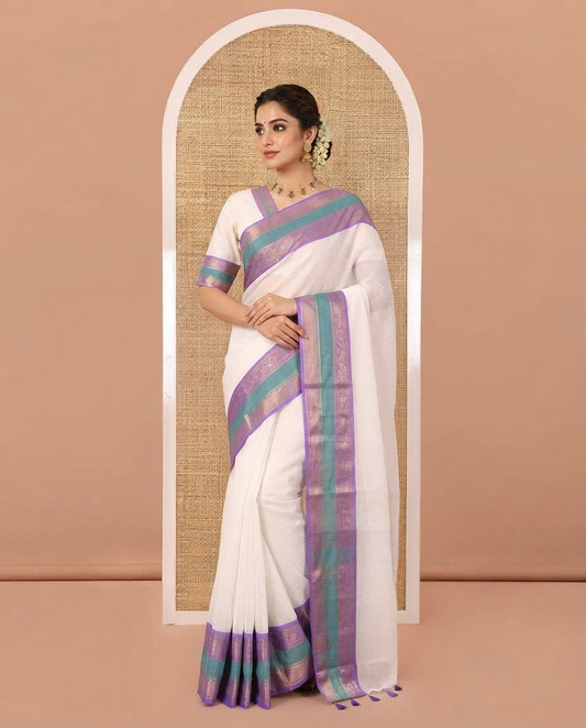 Cream Plain Khadi Mul Cotton Saree, Complemented by a Contrast Rettai Pettu Traditional Zari Design Border, a Self-Pallu, and Paired with a Matching Blouse