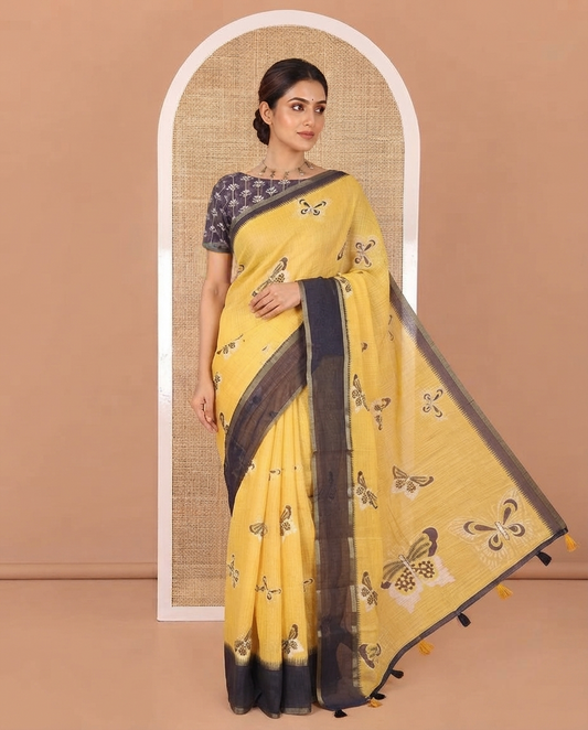 Yellow Linen Cotton Saree, Beautified with Butterfly Motifs Printed On Its Body, Complemented by Temple Border, Pallu Steeped with Butterflies, and Paired with a Contrast Blouse