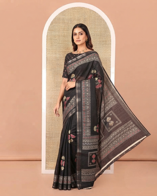 Black Dola Silk Saree, Subtly Enriched with Leaf Motifs Printed On Its Body, Highlighted by Self-Border of Zari and Print Work, Printed Pallu, and Paired with a Matching Blouse