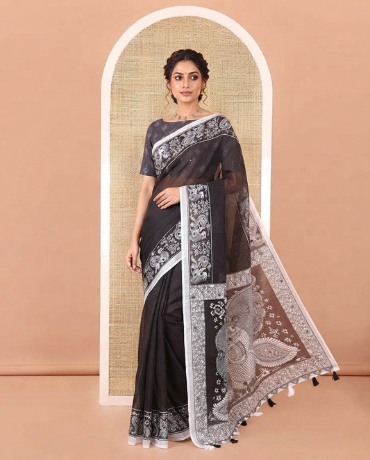 Black Linen Cotton Saree, Subtly Woven with Mirror Work On Its Body, Highlighted by Kalamkari Style Printed Border, Pallu of Kalamkari Peacock, and Paired with a Matching Blouse