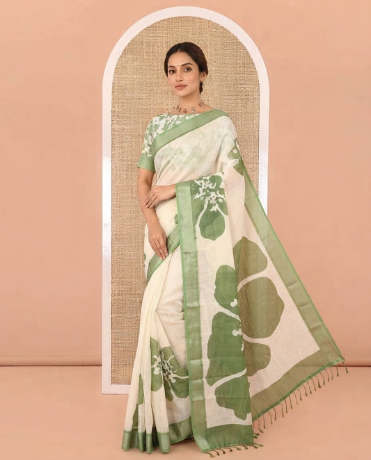 Lemon Yellow Linen Cotton Saree, Prettified with Big Floral Prints On Its Body, Complemented by Contrast Zari Bavanji Border, Floral Printed Pallu, and Paired with a Hand Block Printed Blouse
