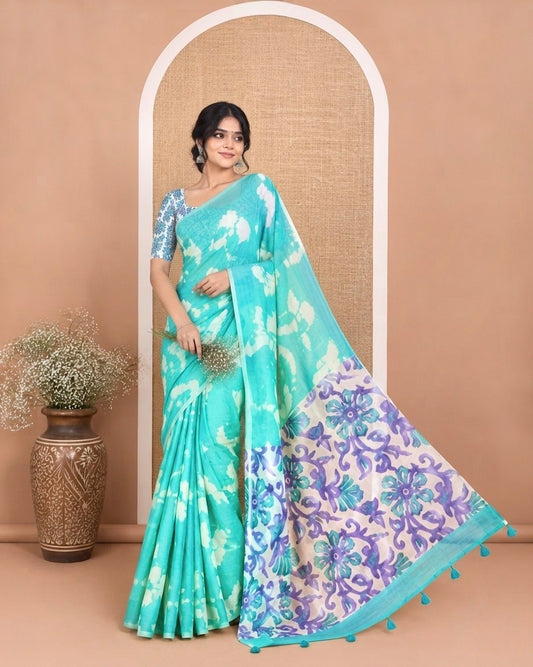 Borderless Rama Linen Cotton Saree, Embellished with Shibori Printed on Its Body, Complemented by Contrast Floral Printed Pallu, and Paired with a Contrast Floral Printed Blouse