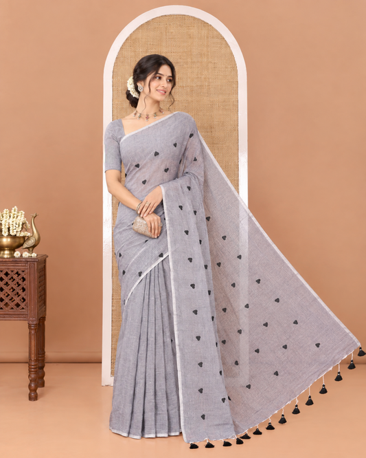 Borderless Grey Khadi Mul Cotton Saree, Artfully Designed with Heart Motifs Embroidery Across Its Body, Pallu mirrors the Same Design, and Paired with a Matching Blouse
