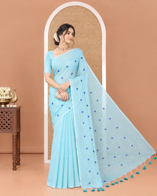 Borderless Sky Blue Khadi Mul Cotton Saree, Artfully Designed with Heart Motifs Embroidery Across Its Body, Pallu mirrors the Same Design, and Paired with a Matching Blouse