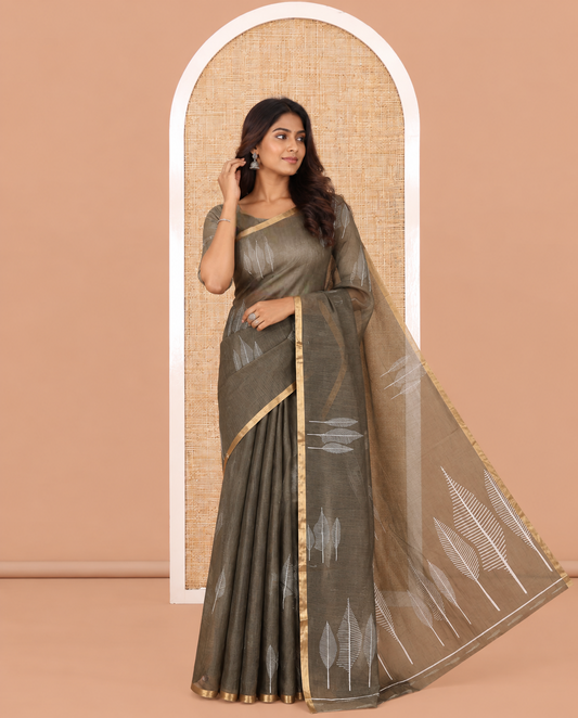 Olive Green Linen Cotton Saree Features Tree Print, a Zari Piping Border, and a Matching Blouse