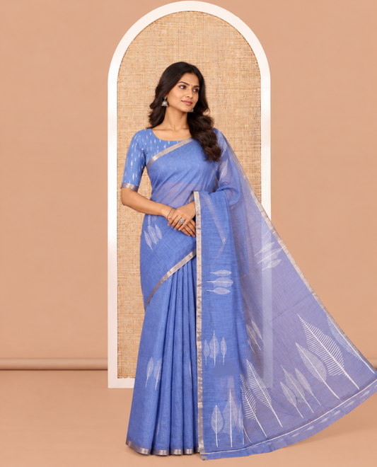 Blue Linen Cotton Saree Features Tree Print, a Zari Piping Border, and a Matching Blouse