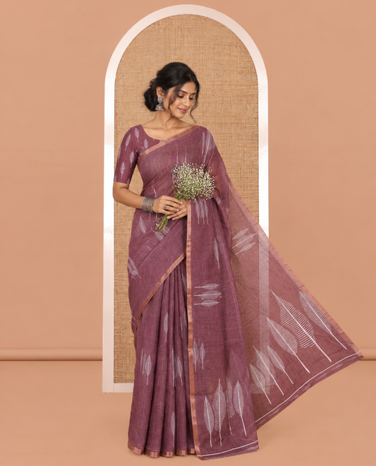 Wine Linen Cotton Saree Features Tree Print, a Zari Piping Border, and a Matching Blouse