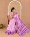 Baby pink small thread buttas linen cotton saree, contrast temple zari piping border, striped pallu and a contrast blouse