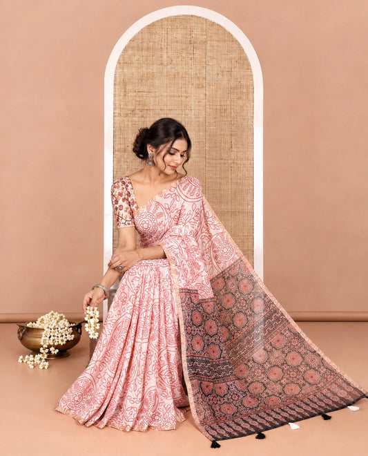 white bandhani-style floral and chakra printed saree, zari piping border, contrast ajrakh printed pallu, and contrast ajrakh printed blouse