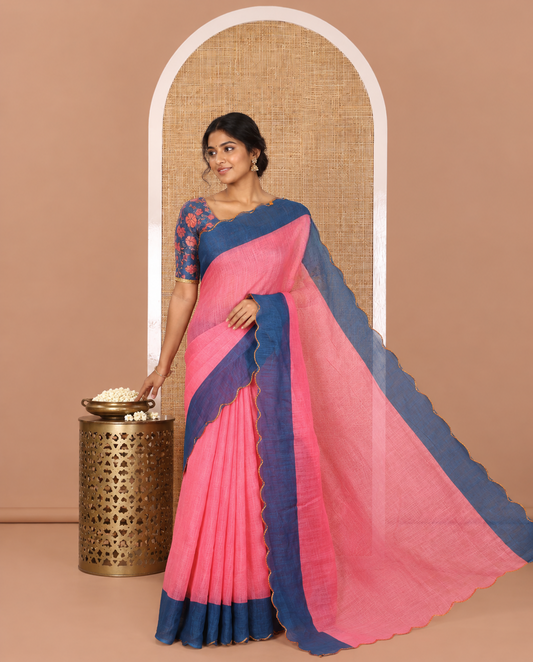 Pink Plain Linen Cotton Saree, Complemented by Contrast Scallop Border, Plain Pallu, and Paired with a Contrast Floral Printed Mirror Embroidered Blouse