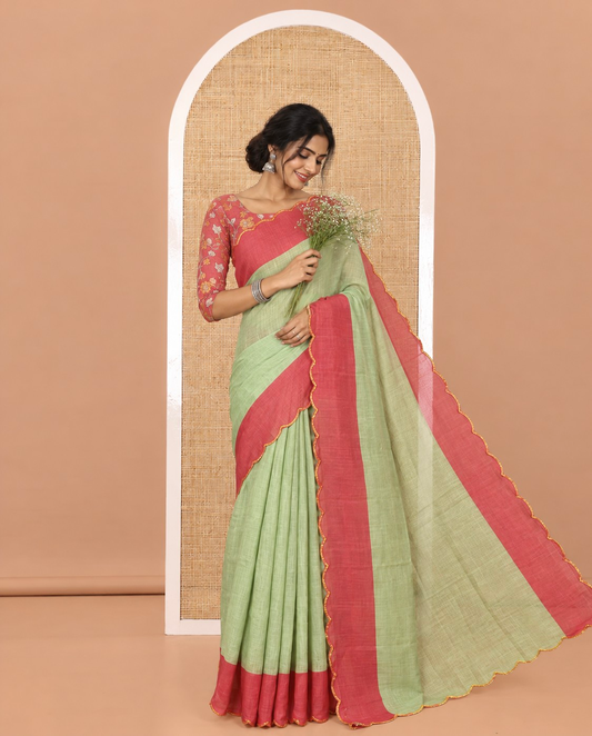 Green Plain Linen Cotton Saree, Complemented by Contrast Scallop Border, Plain Pallu, and Paired with a Contrast Floral Printed Mirror Embroidered Blouse