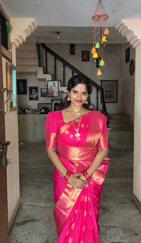 Pink Budget Silk Saree Bedecked with Paisley Buttas All Over Its Body, Highlighted by a Traditional Zari Design Border, Grand Pallu of Jaal Designs, and Paired with a Matching Blouse