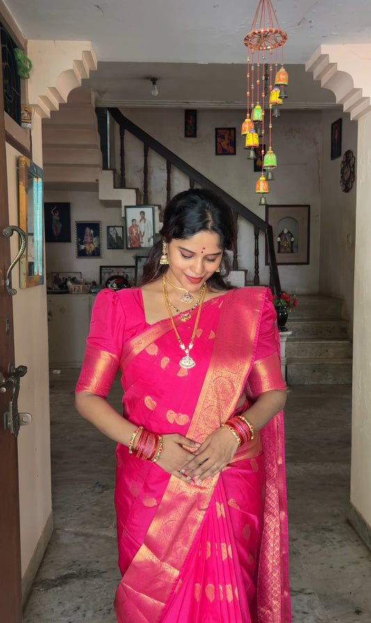 Pink Budget Silk Saree Bedecked with Paisley Buttas All Over Its Body, Highlighted by a Traditional Zari Design Border, Grand Pallu of Jaal Designs, and Paired with a Matching Blouse