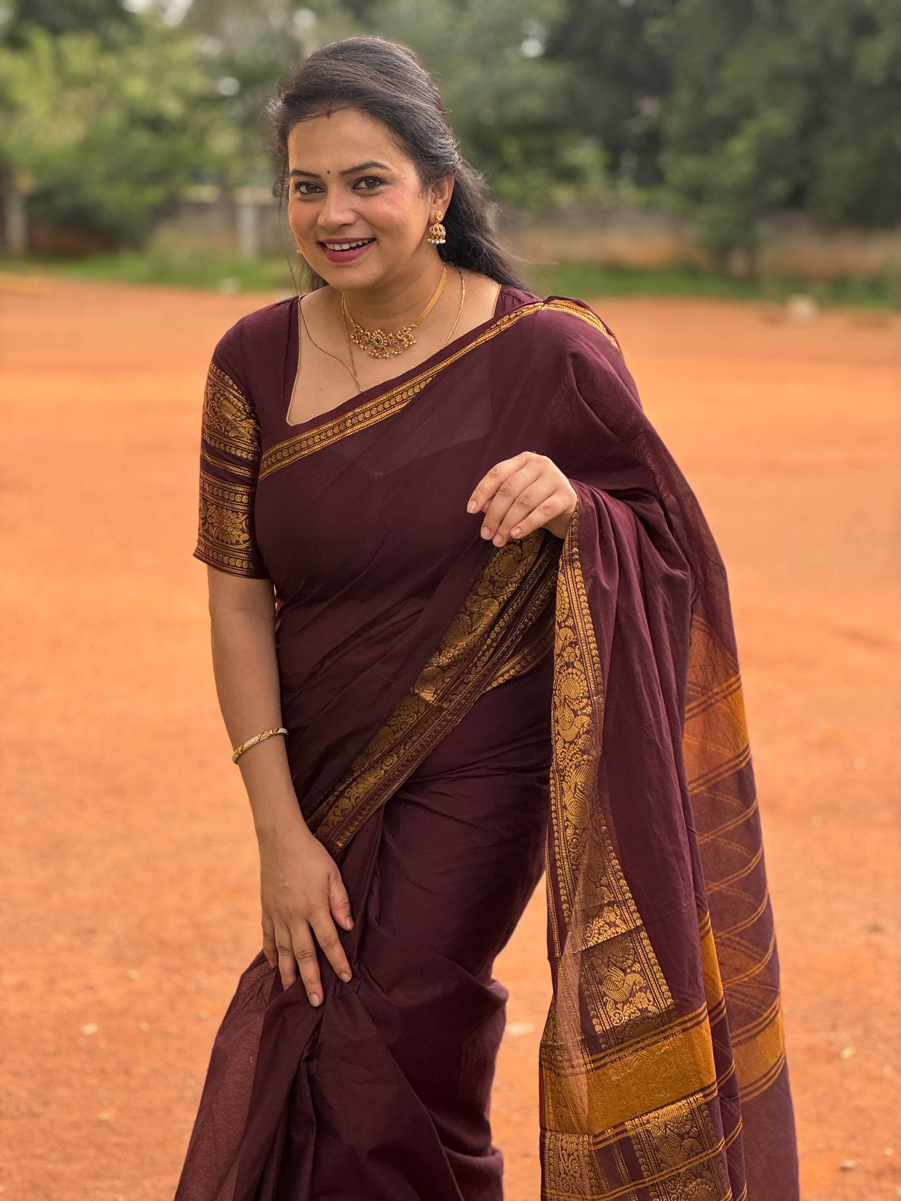 Maroon Plain Chettinad Cotton Saree, Highlighted by Self-Border of Traditional Zari Designs, Subtly Striped Pallu, and Paired with a Matching Blouse