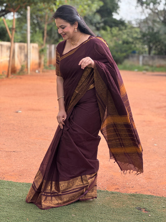 Maroon Plain Chettinad Cotton Saree, Highlighted by Self-Border of Traditional Zari Designs, Subtly Striped Pallu, and Paired with a Matching Blouse