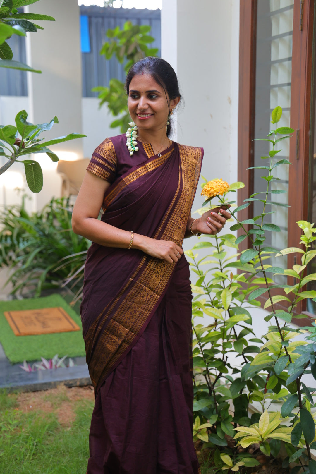 Maroon Plain Chettinad Cotton Saree, Highlighted by a Traditional Zari Border, Striped Pallu, and a Matching Blouse