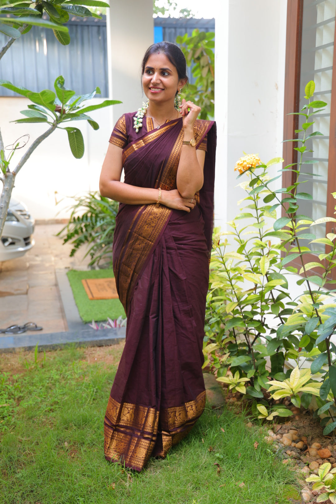 Maroon Plain Chettinad Cotton Saree, Highlighted by a Traditional Zari Border, Striped Pallu, and a Matching Blouse