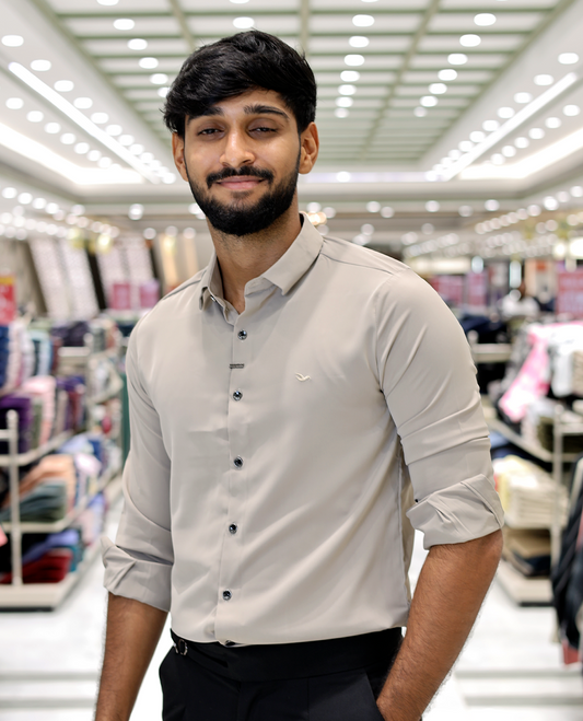 Cream Solid Poly-Blended Formal Shirt Features Full Sleeves, a Slim Fit, a Spread Collar, and Regular Length