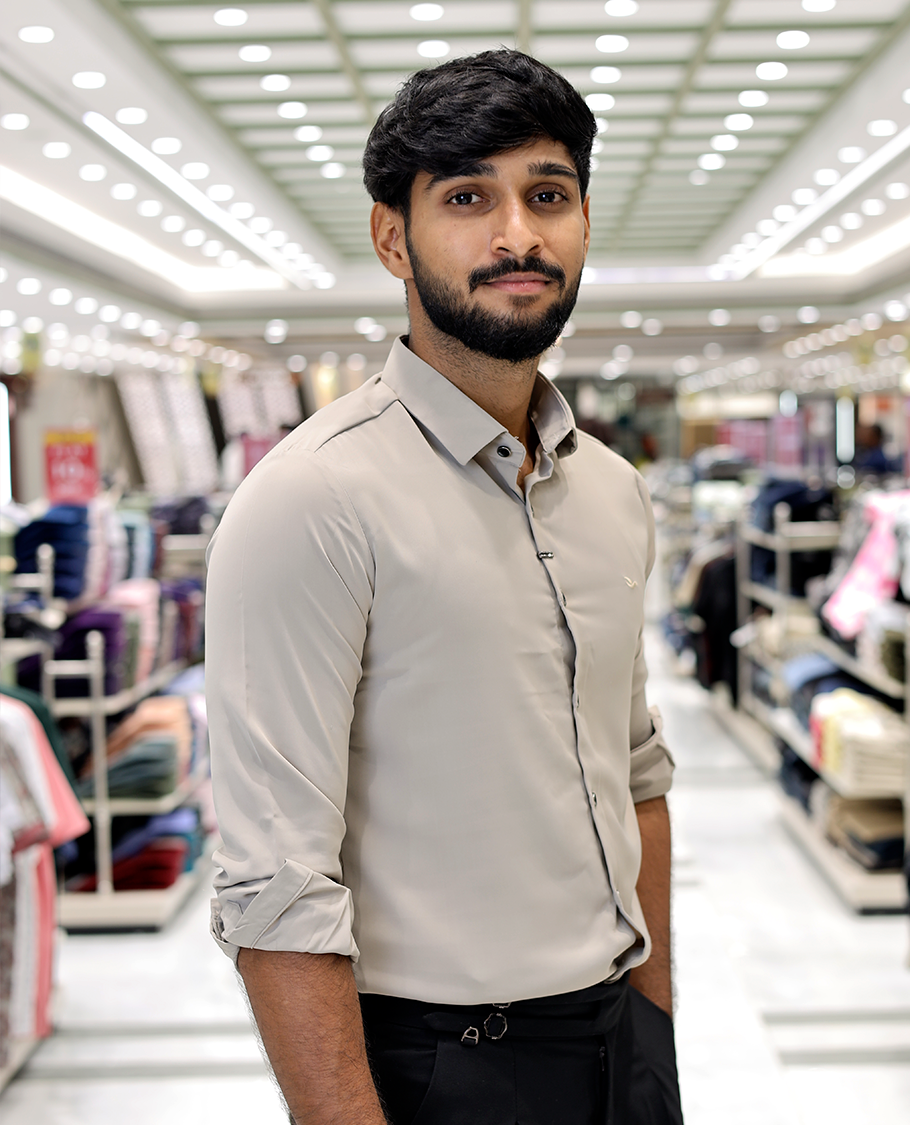 Cream Solid Poly-Blended Formal Shirt Features Full Sleeves, a Slim Fit, a Spread Collar, and Regular Length