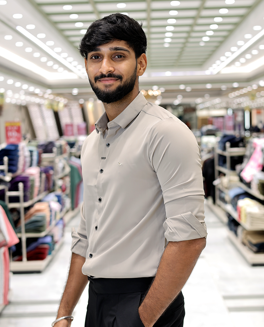 Cream Solid Poly-Blended Formal Shirt Features Full Sleeves, a Slim Fit, a Spread Collar, and Regular Length