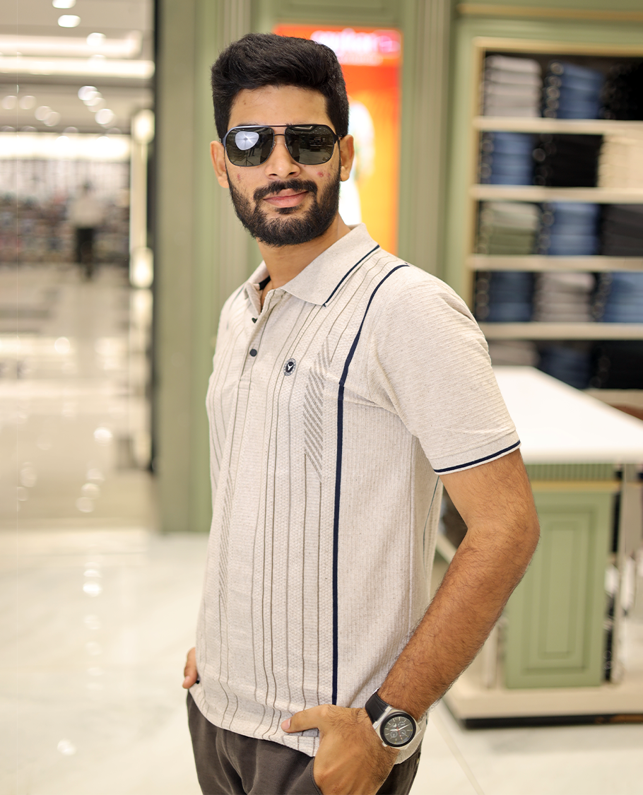 Cream Striped Cotton-Blended T-Shirt Comes with Half-Sleeves, a Polo Neck, a Slim Fit, and Regular Length