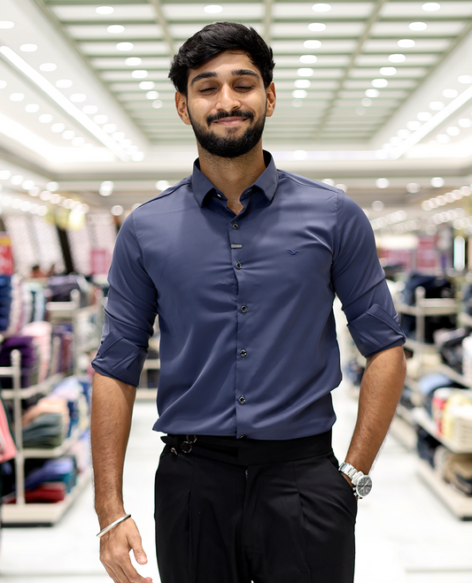 Blue Solid Poly-Blended Formal Shirt Features Full Sleeves, a Slim Fit, a Spread Collar, and Regular Length