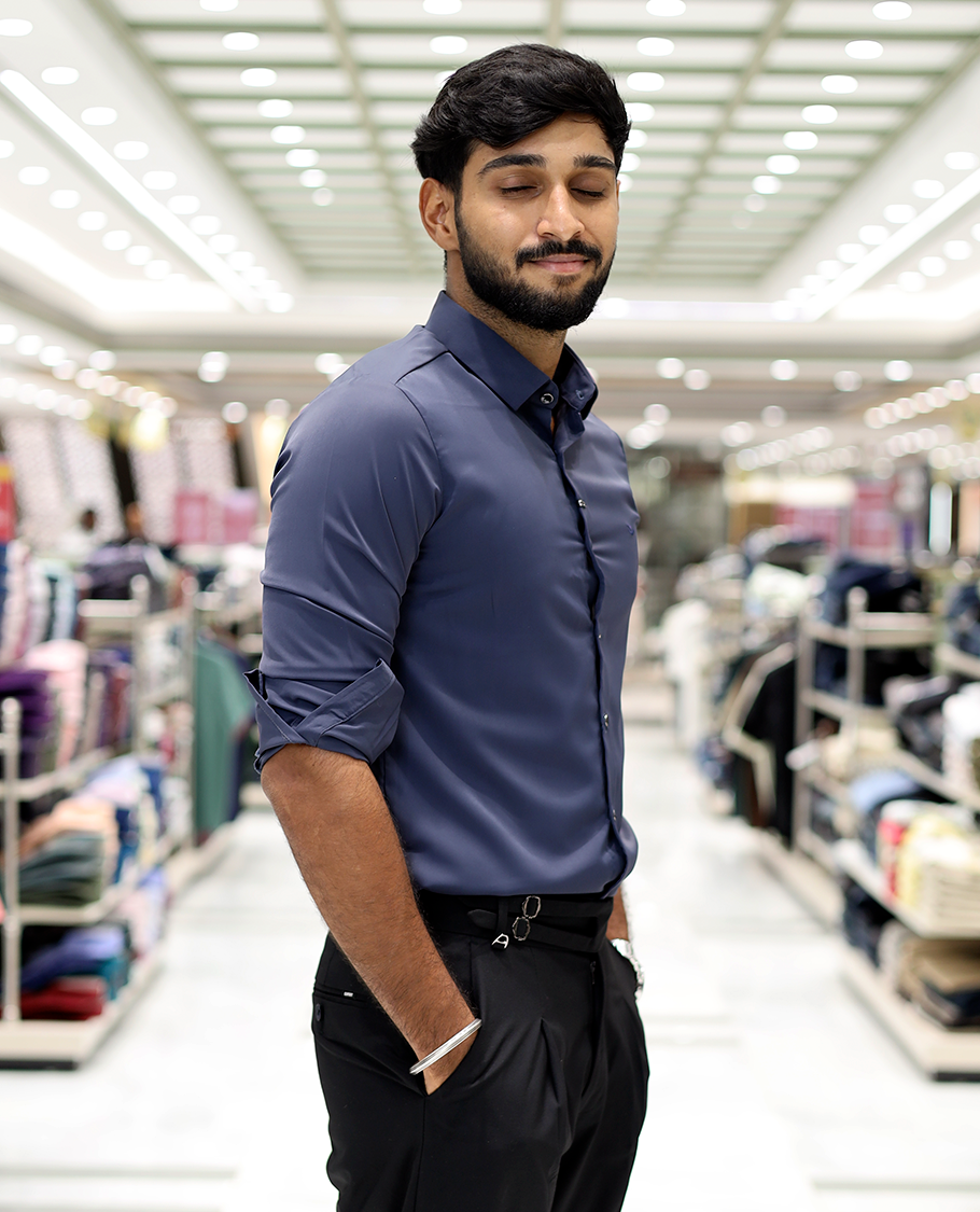 Blue Solid Poly-Blended Formal Shirt Features Full Sleeves, a Slim Fit, a Spread Collar, and Regular Length