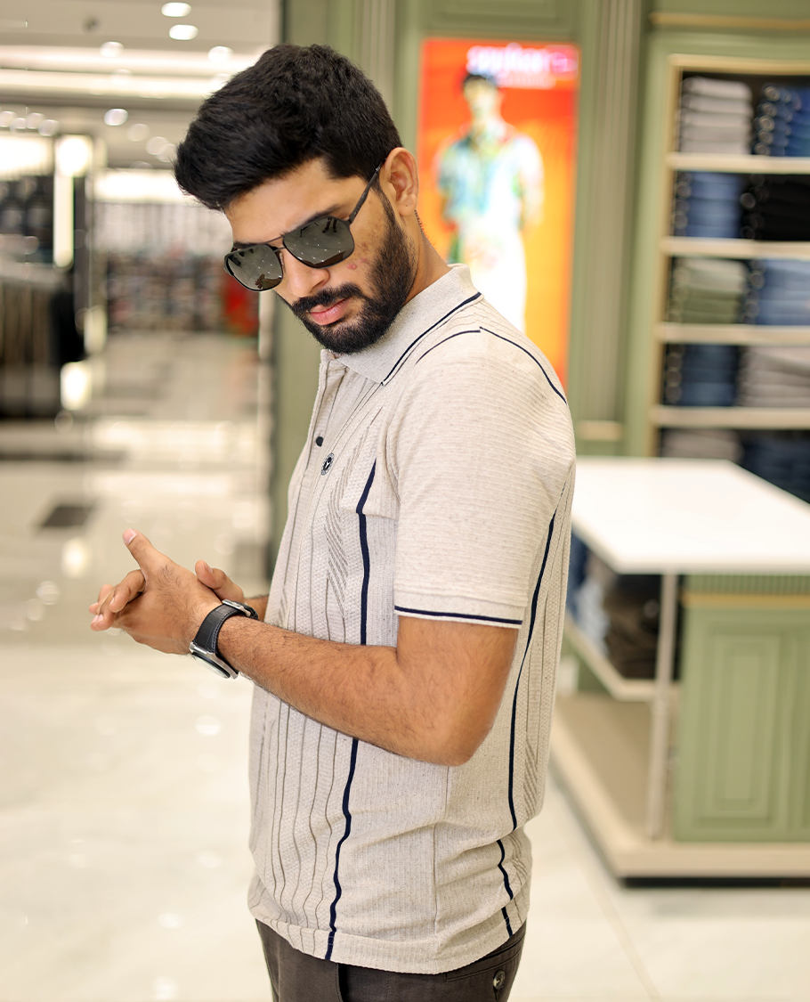 Cream Striped Cotton-Blended T-Shirt Comes with Half-Sleeves, a Polo Neck, a Slim Fit, and Regular Length