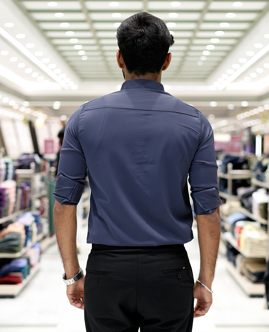 Blue Solid Poly-Blended Formal Shirt Features Full Sleeves, a Slim Fit, a Spread Collar, and Regular Length