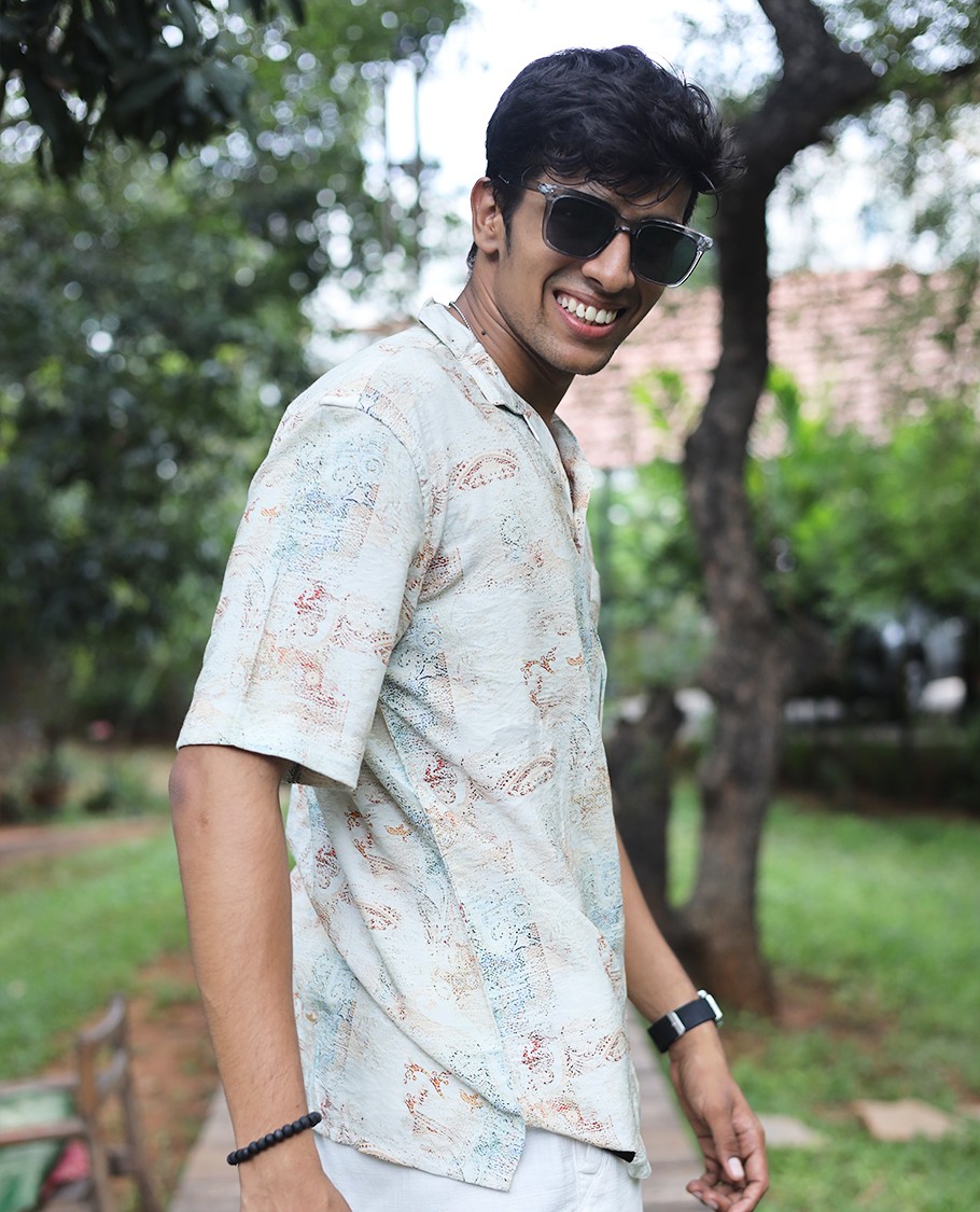 White Cotton-Blended Casual Shirt Adorned with Abstract-Painting-Style Print, Half Sleeves, a Regular Fit, a Cuban Collar, and a Regular Length