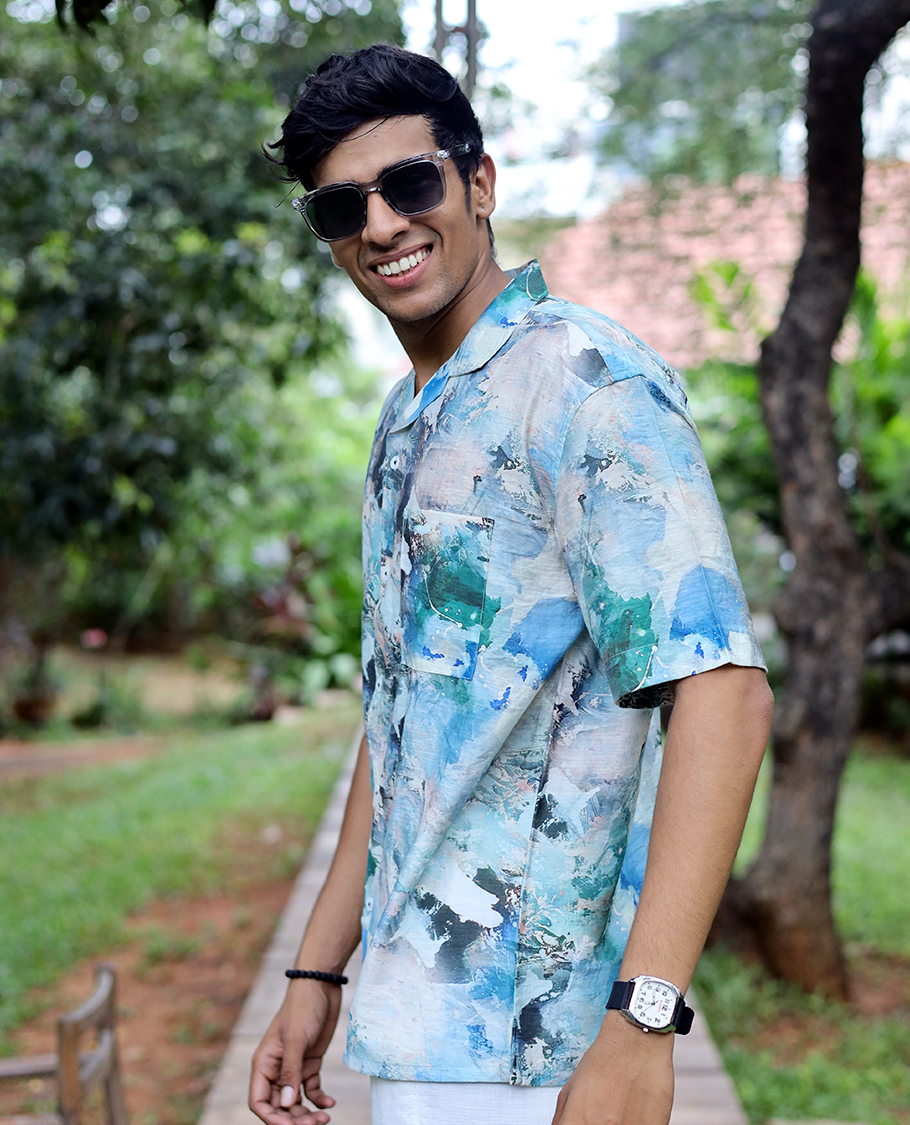 Blue Cotton-Blended Casual Shirt Elevated with Abstract-Painting-Style Print, Half Sleeves, a Regular Fit, a Cuban Collar, and a Regular Length