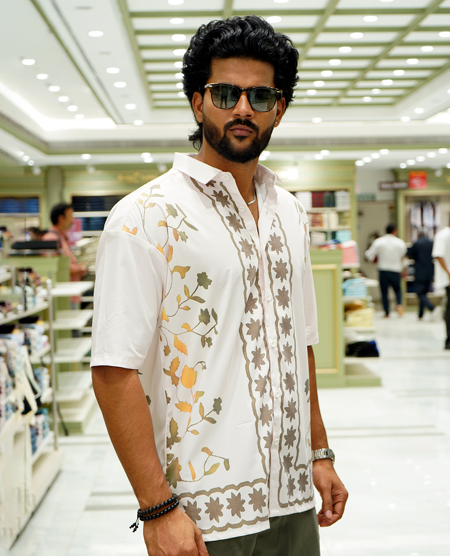 Cream Cotton-Blended Casual Shirt Features Floral Vine Print, Full Sleeves, a Spread Collar, a Slim Fit, and a Regular Length
