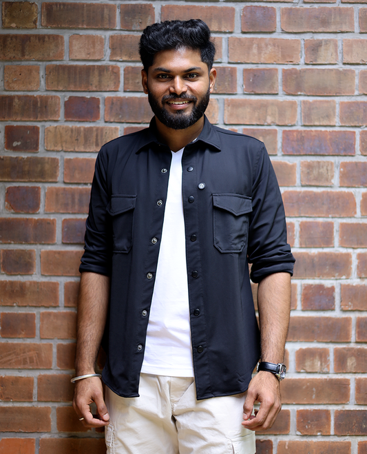 Black Solid Poly-Blended Casual Shirt Featuring Full Sleeves, a Spread Collar, a Slim Fit, and Regular Length