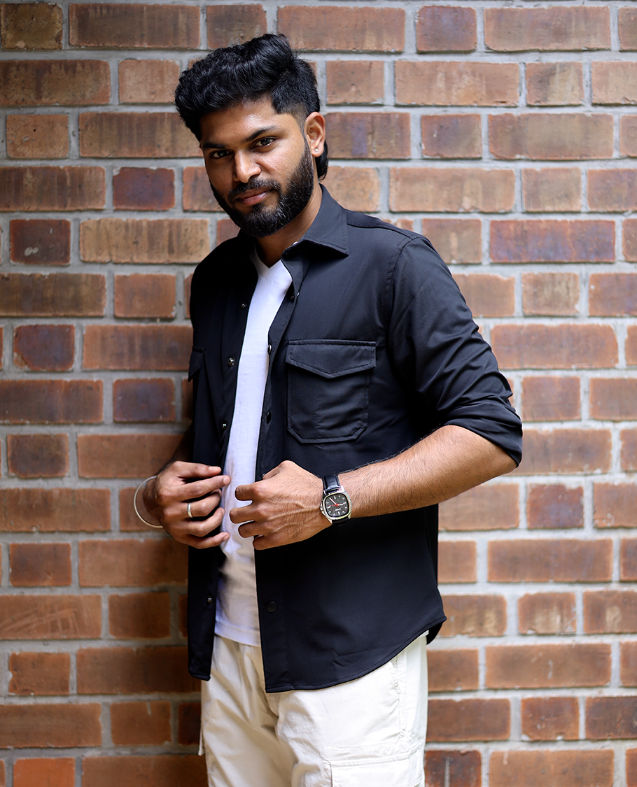 Black Solid Poly-Blended Casual Shirt Featuring Full Sleeves, a Spread Collar, a Slim Fit, and Regular Length