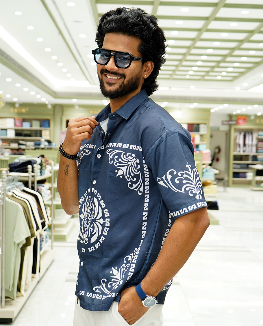 Blue Cotton-Blended Casual Shirt Features Contemporary Print, Full Sleeves, a Spread Collar, a Slim Fit, and a Regular Length