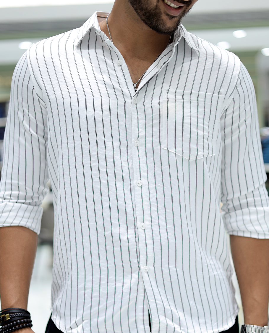 White Striped Poly-Blended Formal Shirt Comes with Full Sleeves, a Spread Collar, a Slim Fit, and a Regular Length