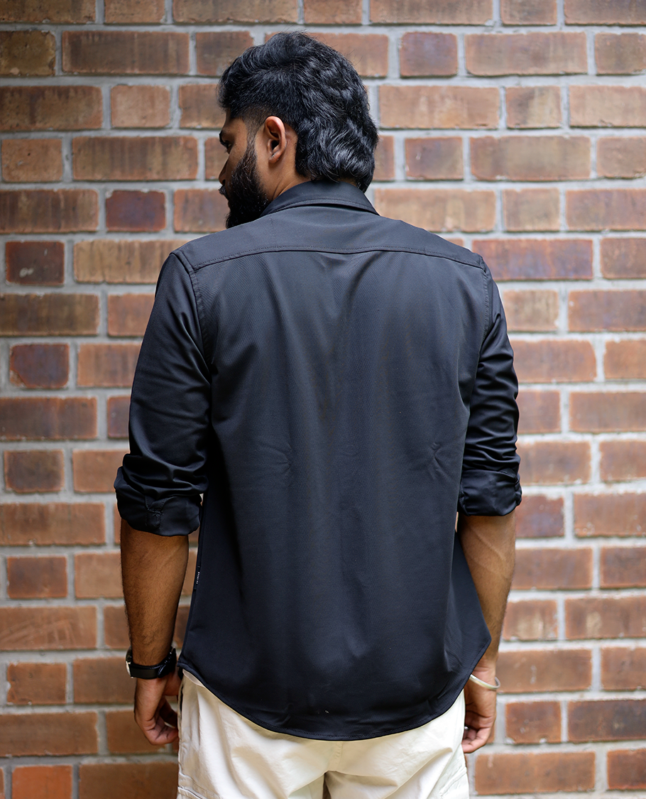 Black Solid Poly-Blended Casual Shirt Featuring Full Sleeves, a Spread Collar, a Slim Fit, and Regular Length