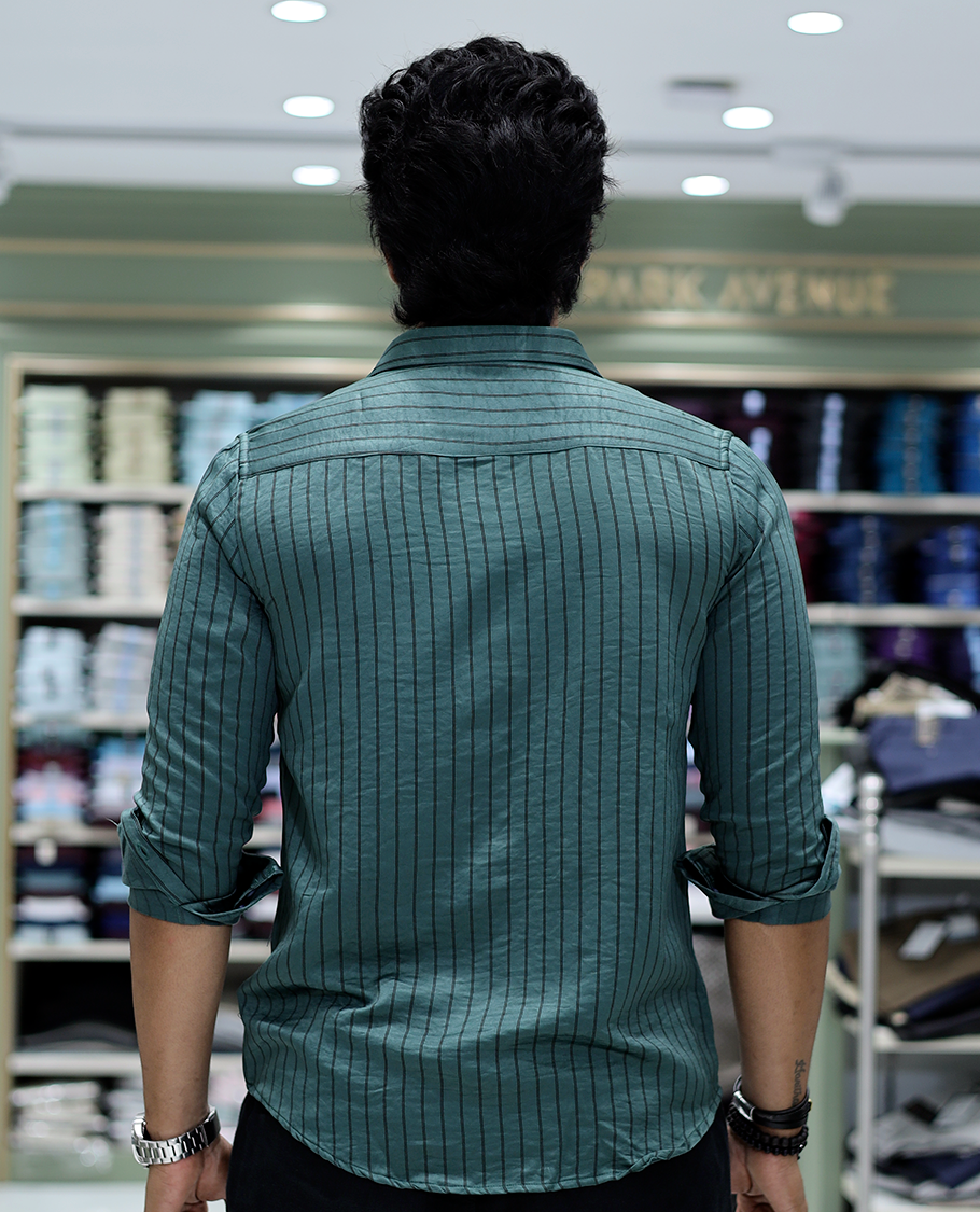 Green Striped Poly-Blended Formal Shirt Comes with Full Sleeves, a Spread Collar, a Slim Fit, and a Regular Length